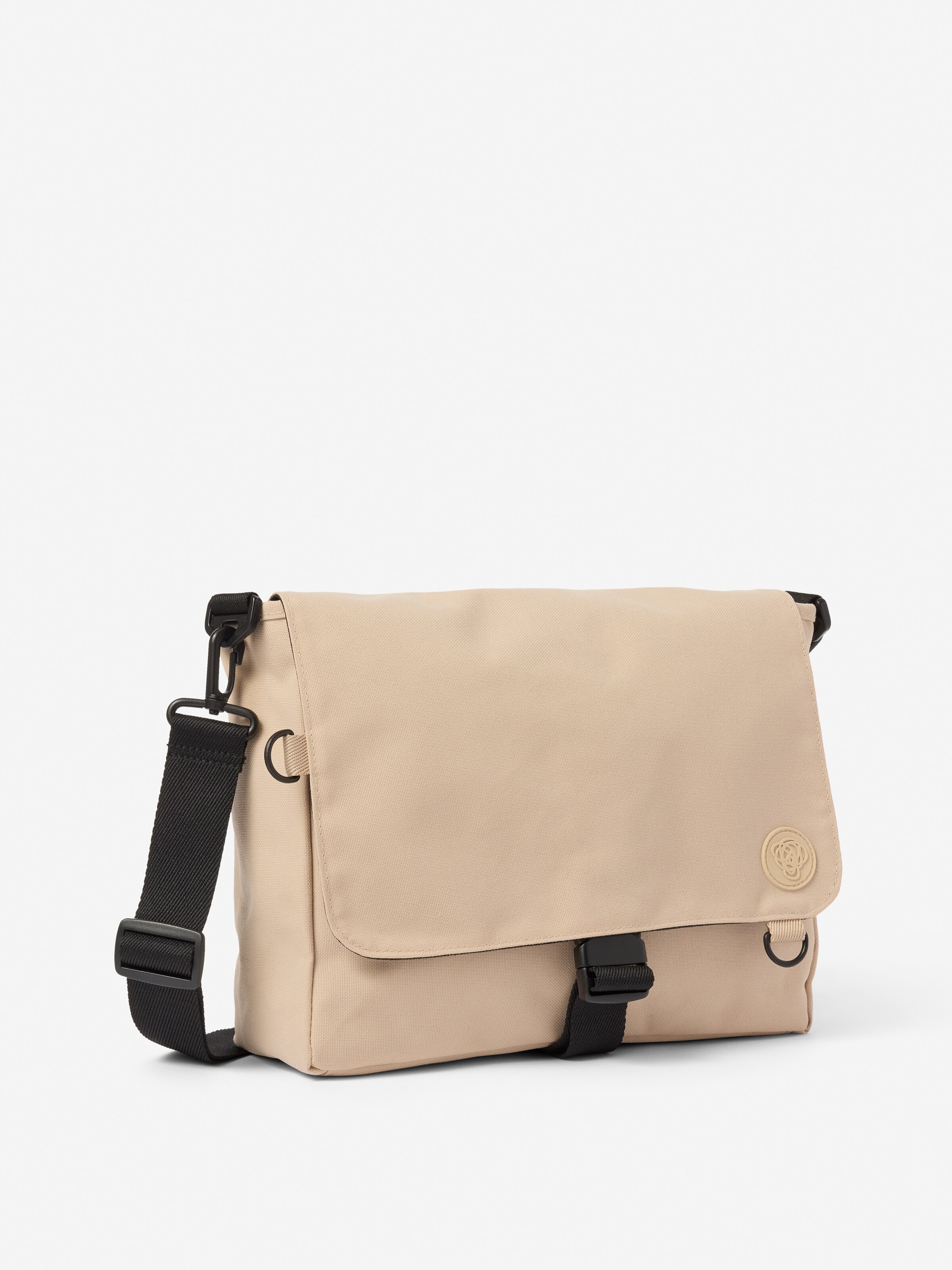 Tobi Reversible Messenger Bag