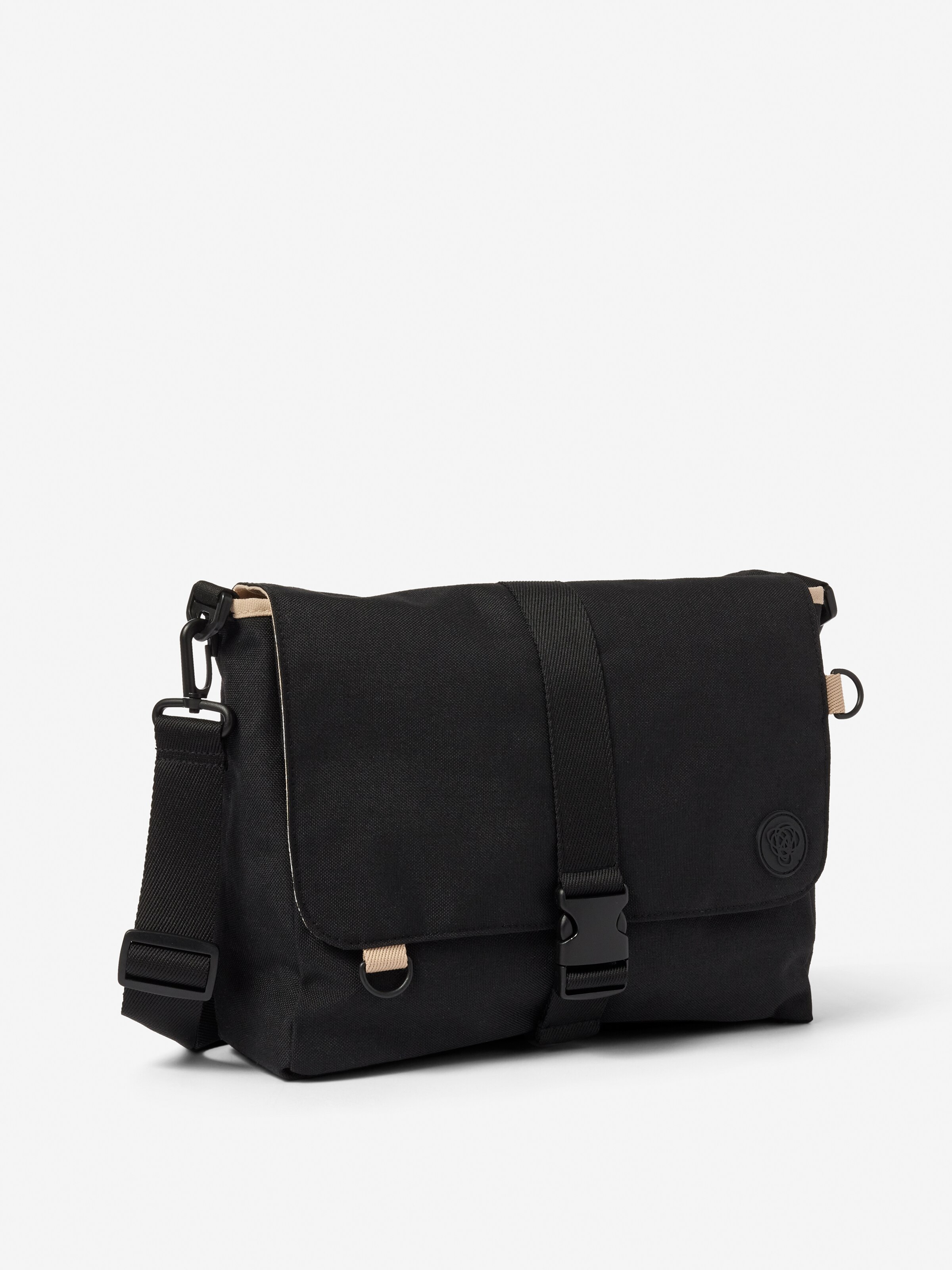 Tobi Reversible Messenger Bag